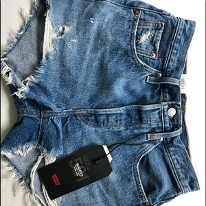 Levi’s 501 High Rise Medium Wash Denim Shorts